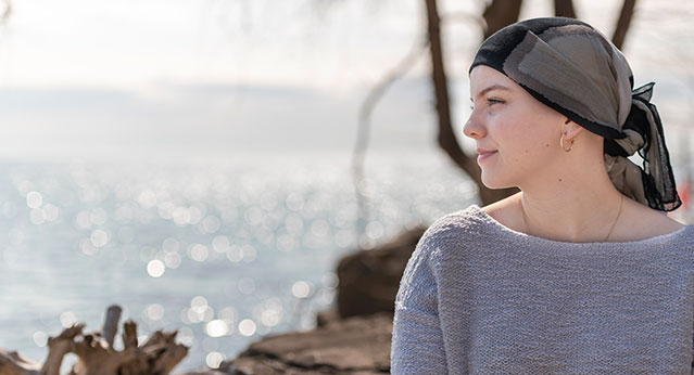 Portrait of a beautiful young woman with cancer