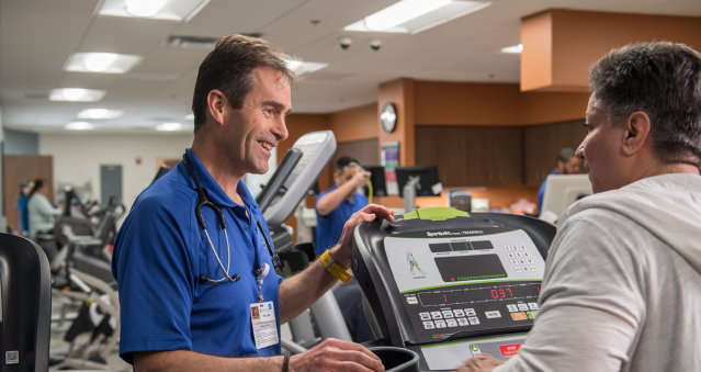 patient talking to physical therapist